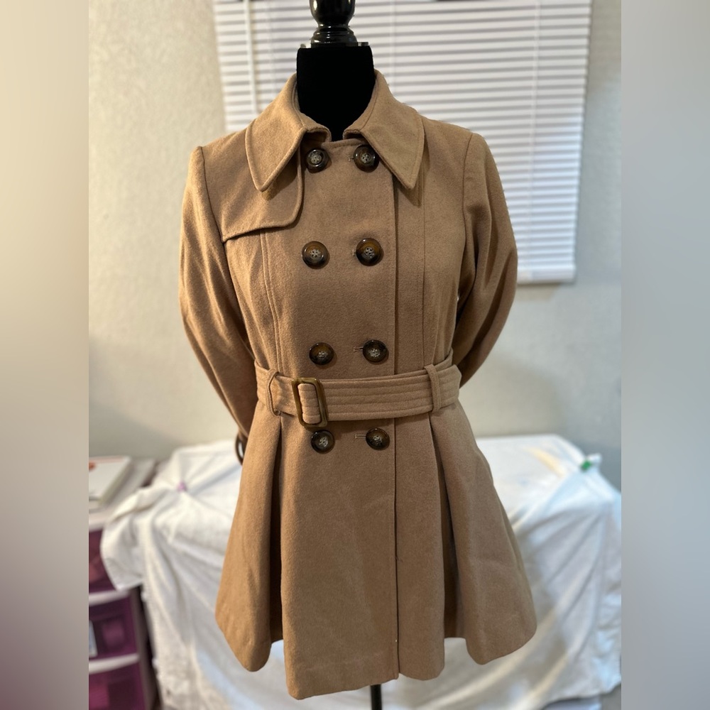 Timeless tan camel dress pea coat, mid thigh length. Exudes both warmth & style.